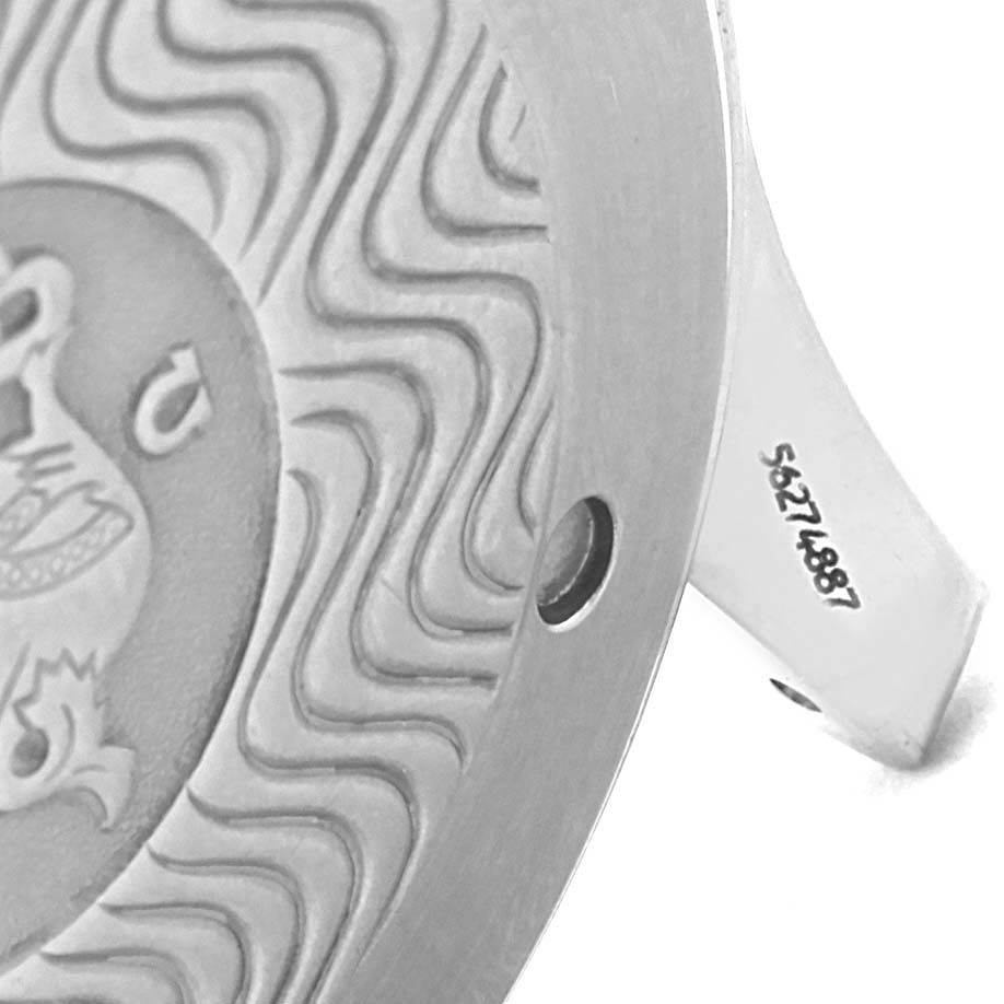 The image shows a macro shot of the case back and partial serial number of an Omega Seamaster 2541.80.00 Men
s Stainless Steel Blue Dial 2541.80.00 Men
s Stainless Steel Blue Dial watch.