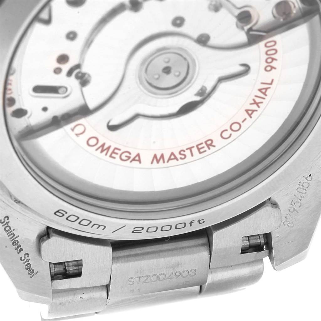 The image shows the back view of the Omega Seamaster 232.90.46.51.03.001 Men
s Stainless Steel Blue Dial 232.90.46.51.03.001 Men
s Stainless Steel Blue Dial watch, highlighting its co-axial master chronometer movement and stainless steel bracelet.