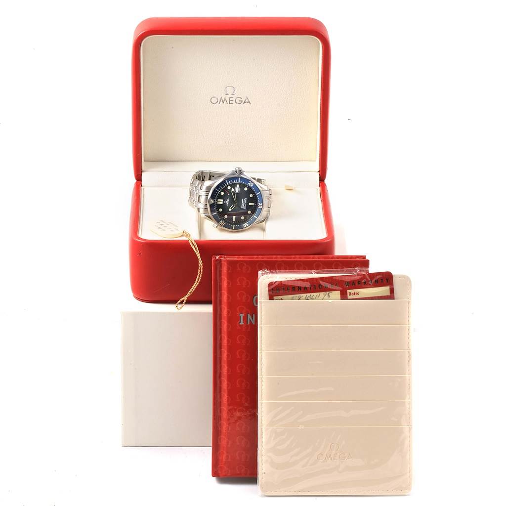 The Omega Seamaster 2541.80.00 Men
s Stainless Steel Blue Dial 2541.80.00 Men
s Stainless Steel Blue Dial watch is displayed in its case with manuals, warranty cards, and an identification card holder included.