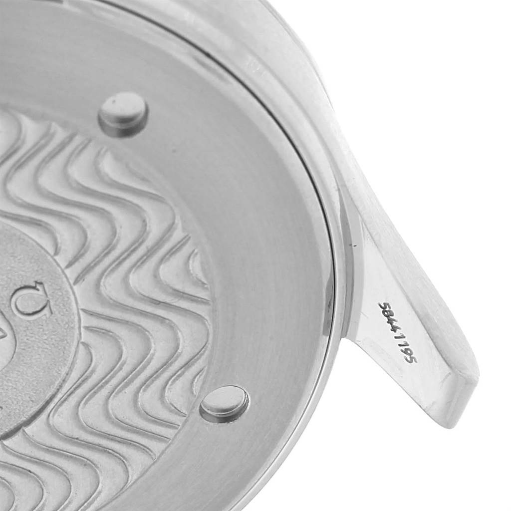 This image shows a close-up of the case back of an Omega Seamaster 2541.80.00 Men
s Stainless Steel Blue Dial 2541.80.00 Men
s Stainless Steel Blue Dial watch, featuring the engraved serial number.