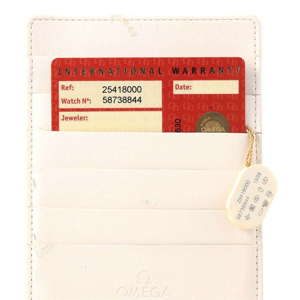 The image shows an International Warranty card and tag for an Omega Seamaster 2541.80.00 Men
s Stainless Steel Blue Dial 2541.80.00 Men
s Stainless Steel Blue Dial watch, placed inside a white holder.