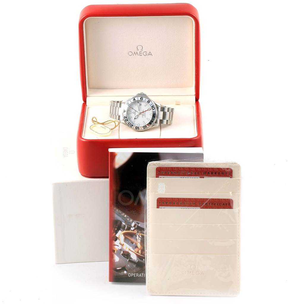 The Omega Seamaster 2538.20.00 Men's Stainless Steel White Dial 2538.20.00 Men's Stainless Steel White Dial watch is displayed front-facing in its open case, accompanied by manuals and warranty cards.