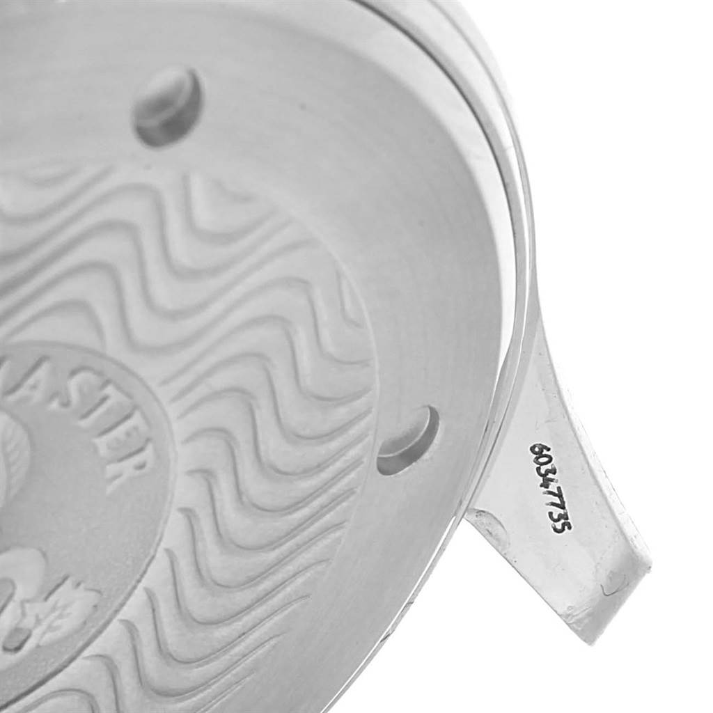 This image shows a close-up of the back case of an Omega Seamaster 2531.80.00 Men
s Stainless Steel Blue Dial 2531.80.00 Men
s Stainless Steel Blue Dial watch, highlighting its engraving and serial number.