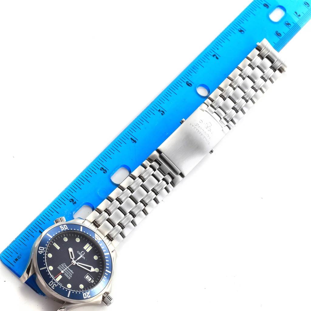 The image shows the Omega Seamaster 2531.80.00 Men
s Stainless Steel Blue Dial 2531.80.00 Men
s Stainless Steel Blue Dial watch horizontally, featuring the face, bezel, and metal bracelet, with a ruler for scale.