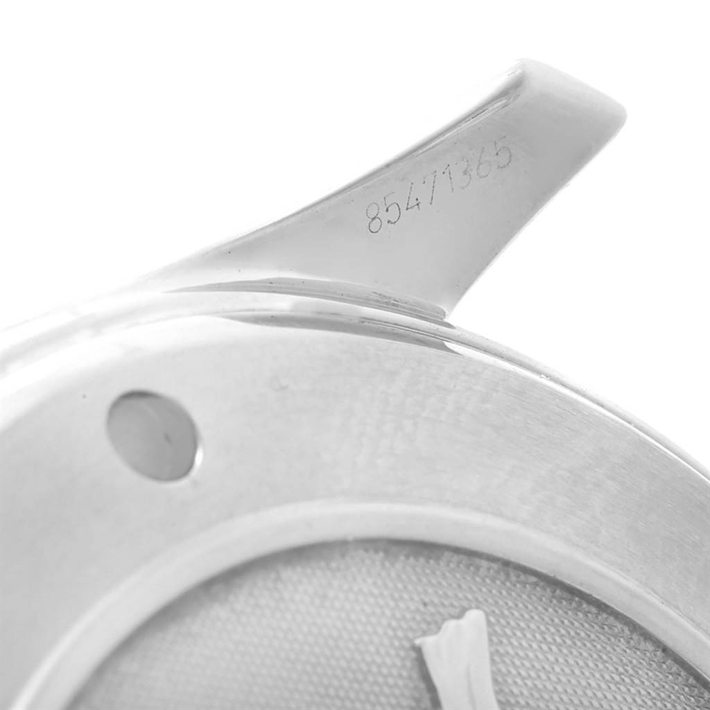 The image shows a close-up of the lug and part of the case back of an Omega Seamaster 212.30.41.20.01.002 Men
s Stainless Steel Black Dial 212.30.41.20.01.002 Men
s Stainless Steel Black Dial watch, including a visible serial number.