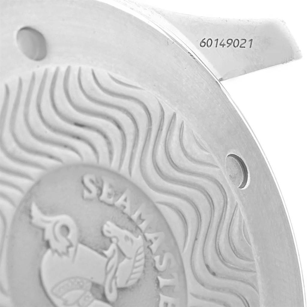 The image shows a close-up of the back casing of an Omega Seamaster 2531.80.00 Men
s Stainless Steel Blue Dial 2531.80.00 Men
s Stainless Steel Blue Dial watch, highlighting its engraved logo and partial serial number.