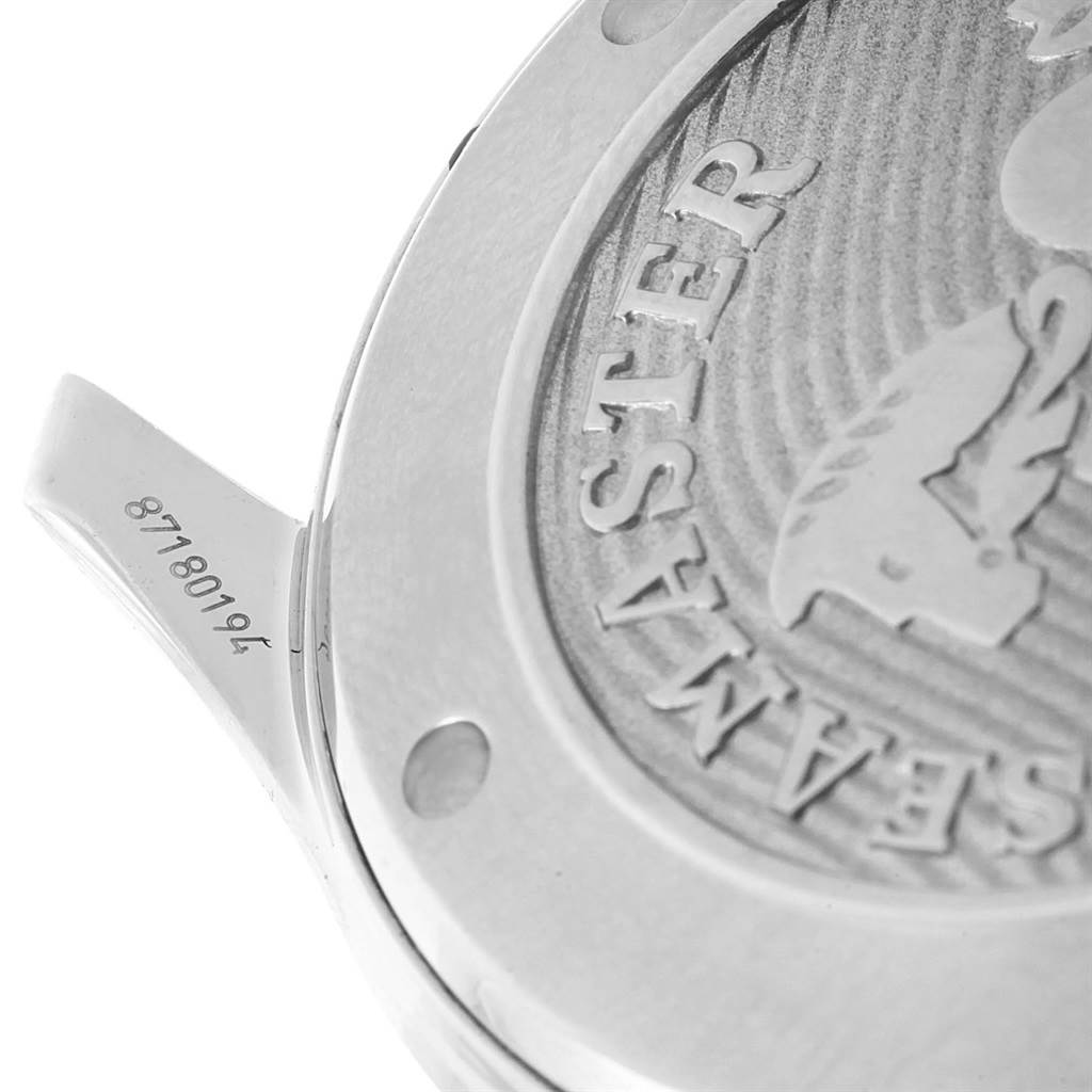 This close-up image shows part of the case back of an Omega Seamaster 212.30.41.20.03.001 Men
s Stainless Steel Blue Dial 212.30.41.20.03.001 Men
s Stainless Steel Blue Dial watch, including its engraving and part of the lug.