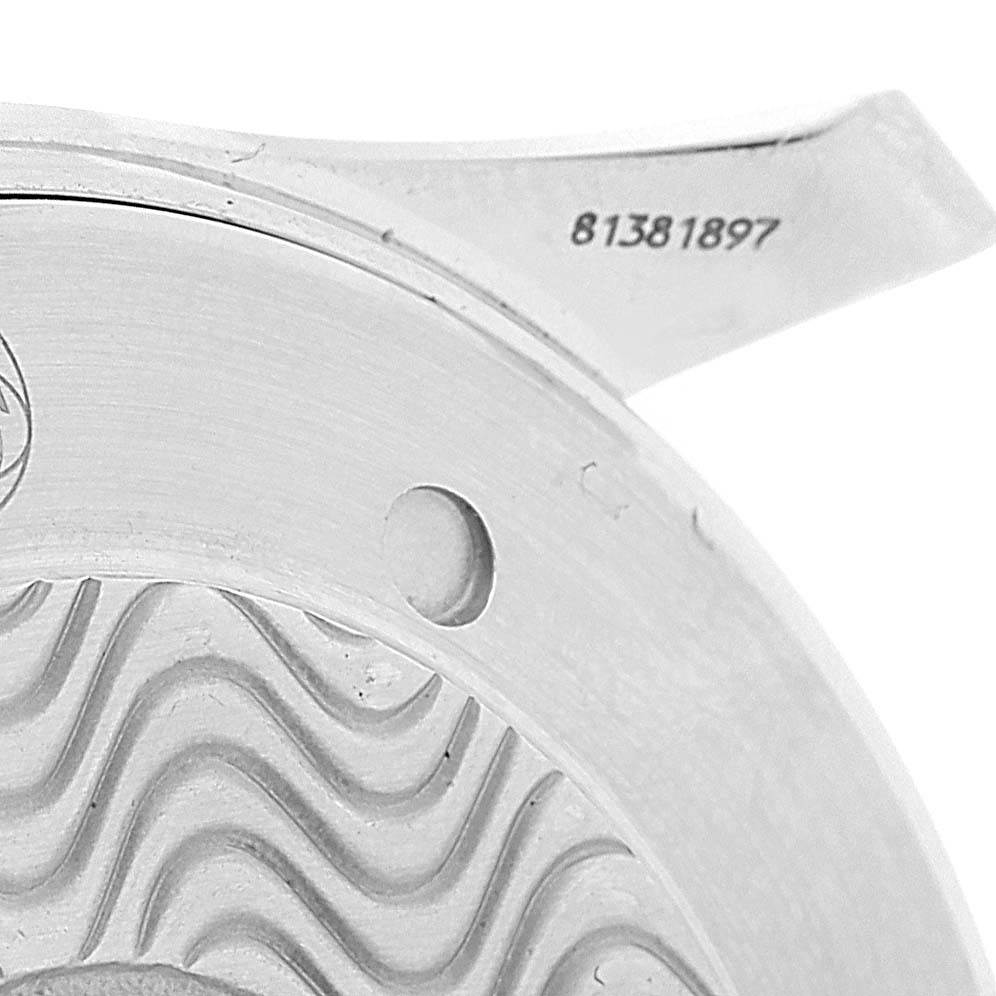 The image shows a close-up of the case back, specifically the wave pattern design and a lug of the Omega Seamaster 2255.80.00 Men
s Stainless Steel Blue Dial 2255.80.00 Men
s Stainless Steel Blue Dial watch.