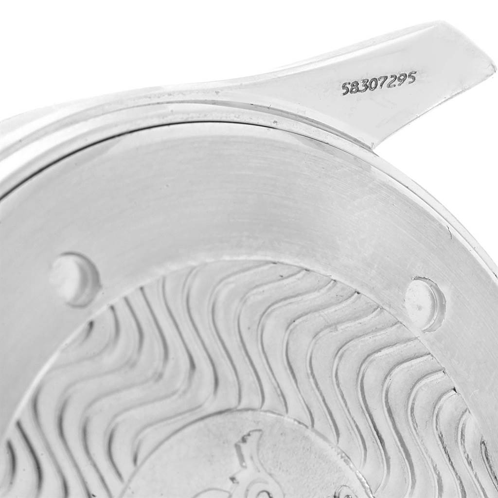 The image shows a close-up of the back case of an Omega Seamaster 2265.80.00 Men
s Stainless Steel Blue Dial 2265.80.00 Men
s Stainless Steel Blue Dial watch, highlighting the intricate wave pattern and partial serial number.