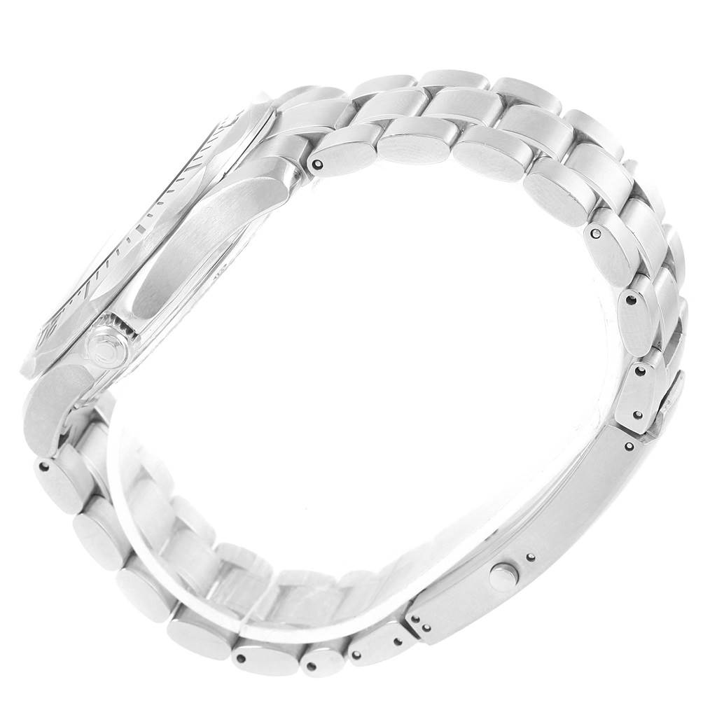 The image shows a side view of an Omega Seamaster 2265.80.00 Men
s Stainless Steel Blue Dial 2265.80.00 Men
s Stainless Steel Blue Dial watch highlighting its silver bracelet and clasp.