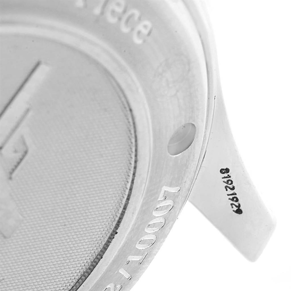 The image shows a close-up of the case back and part of the lug of an Omega Seamaster 212.30.41.20.01.001 Men's Stainless Steel Black Dial 212.30.41.20.01.001 Men's Stainless Steel Black Dial watch.