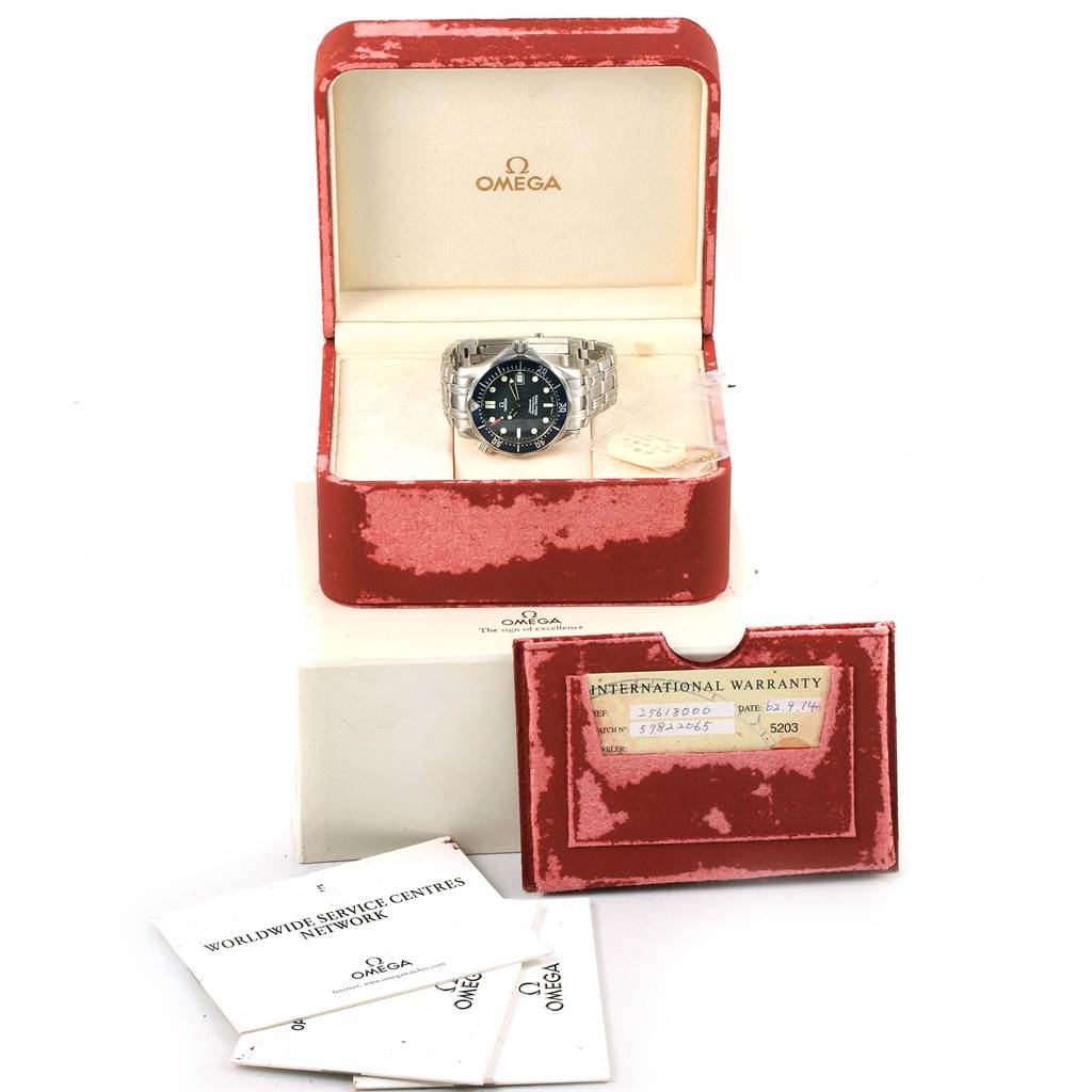 The image shows an Omega Seamaster 2561.80.00 Men
s Stainless Steel Blue Dial 2561.80.00 Men
s Stainless Steel Blue Dial watch in its box, along with warranty papers and other documentation.