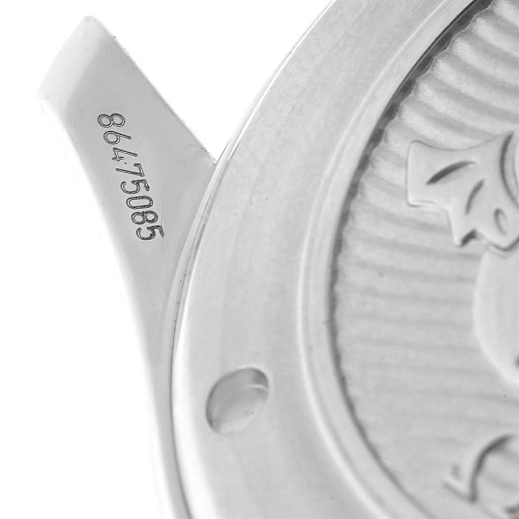 The image shows a close-up of the serial number and partial case back design of the Omega Seamaster 212.30.41.20.03.001 Men
s Stainless Steel Blue Dial 212.30.41.20.03.001 Men
s Stainless Steel Blue Dial watch.