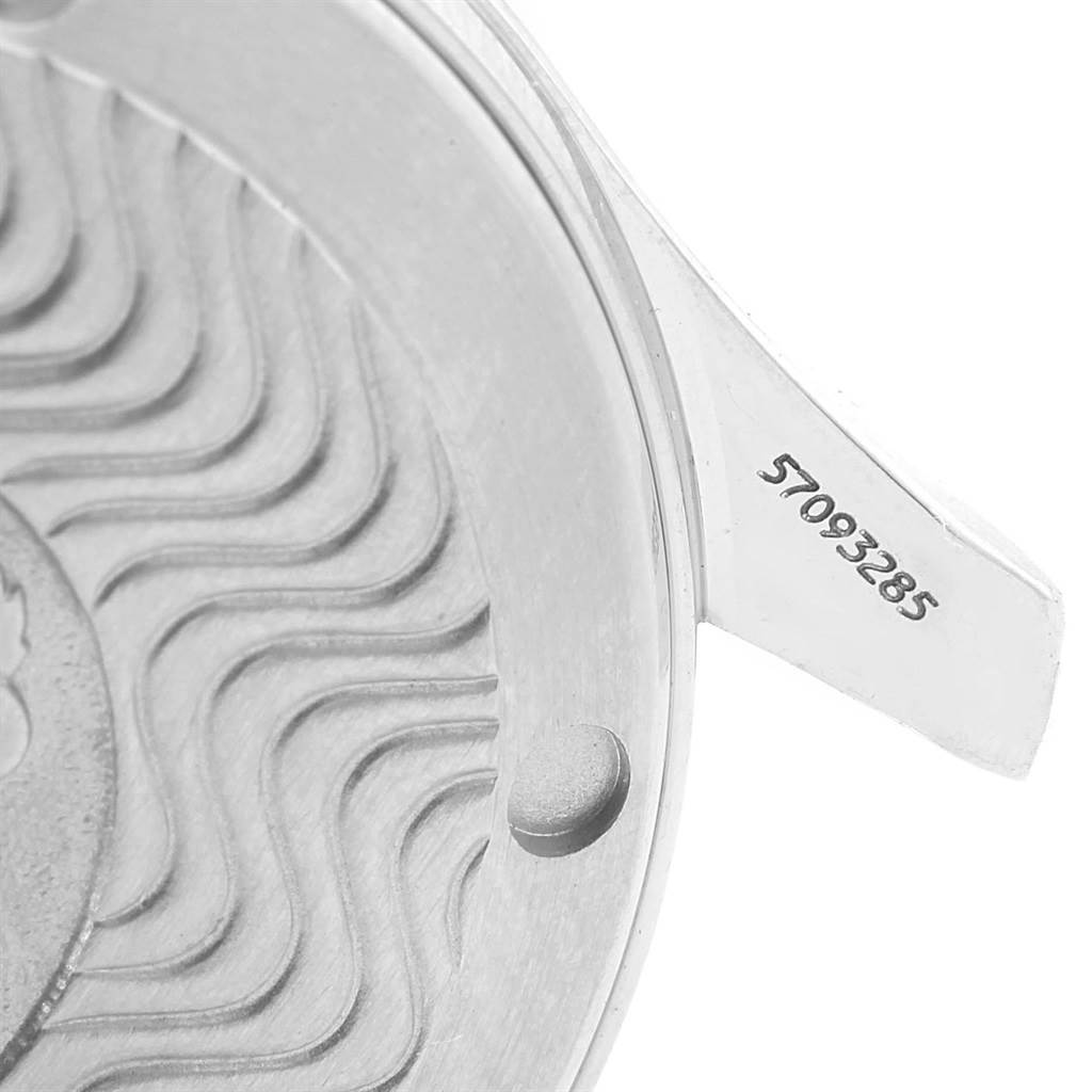 This image shows a close-up of the underside of a watch case back for an Omega Seamaster 2561.80.00 Men
s Stainless Steel Blue Dial 2561.80.00 Men
s Stainless Steel Blue Dial, featuring the serial number.