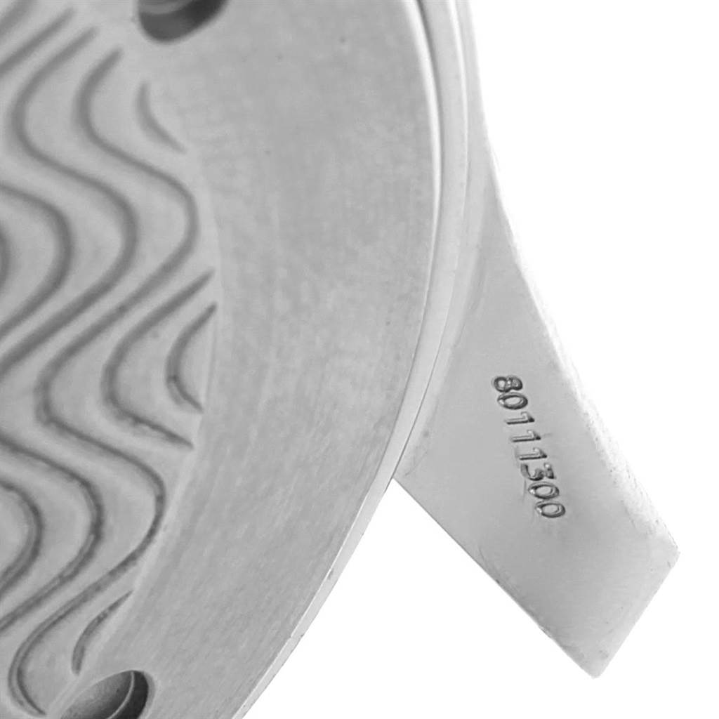 This close-up image shows the engraved edge and the serial number of the Omega Seamaster 2531.80.00 Men
s Stainless Steel Blue Dial 2531.80.00 Men
s Stainless Steel Blue Dial watch.