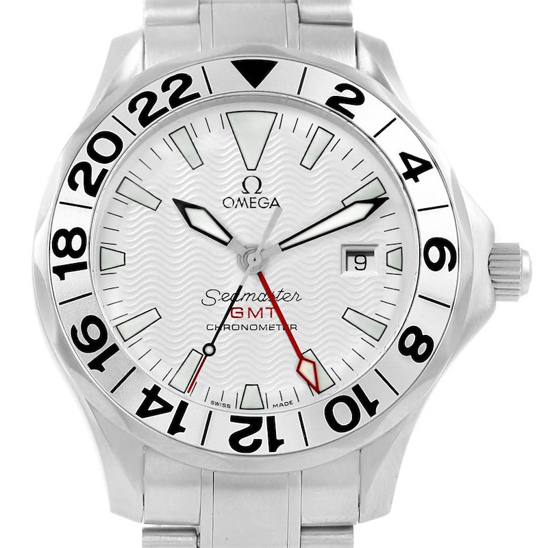 The image shows a front view of an Omega Seamaster GMT Chronometer watch, highlighting its face, bezel, hands, and part of the stainless steel bracelet.