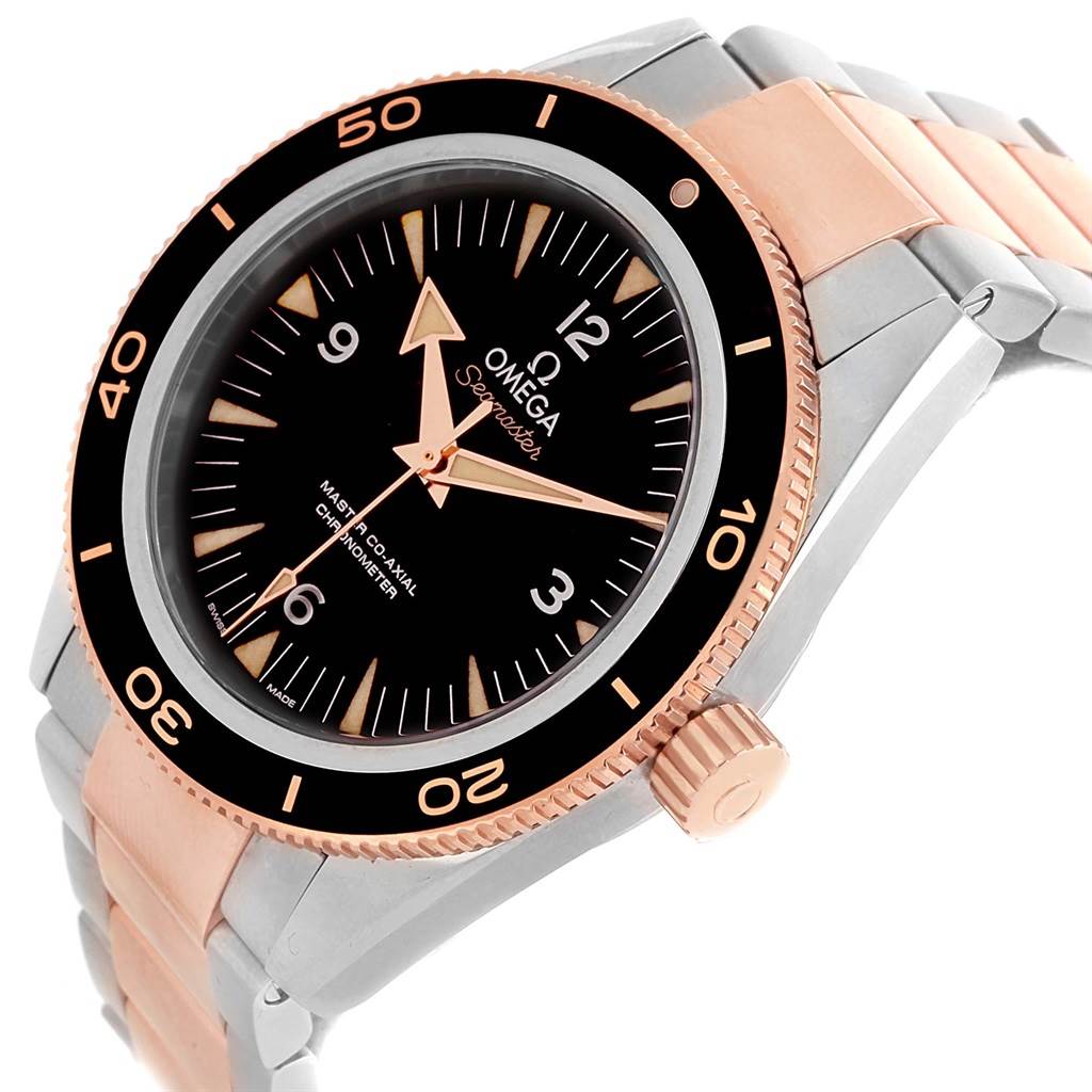 This image shows an angled view of the Omega Seamaster 233.20.41.21.01.001 Men's Steel and Gold (two tone) Black Dial 233.20.41.21.01.001 Men's Steel and Gold (two tone) Black Dial watch, focusing on the dial, bezel, crown, and part of the bracelet.