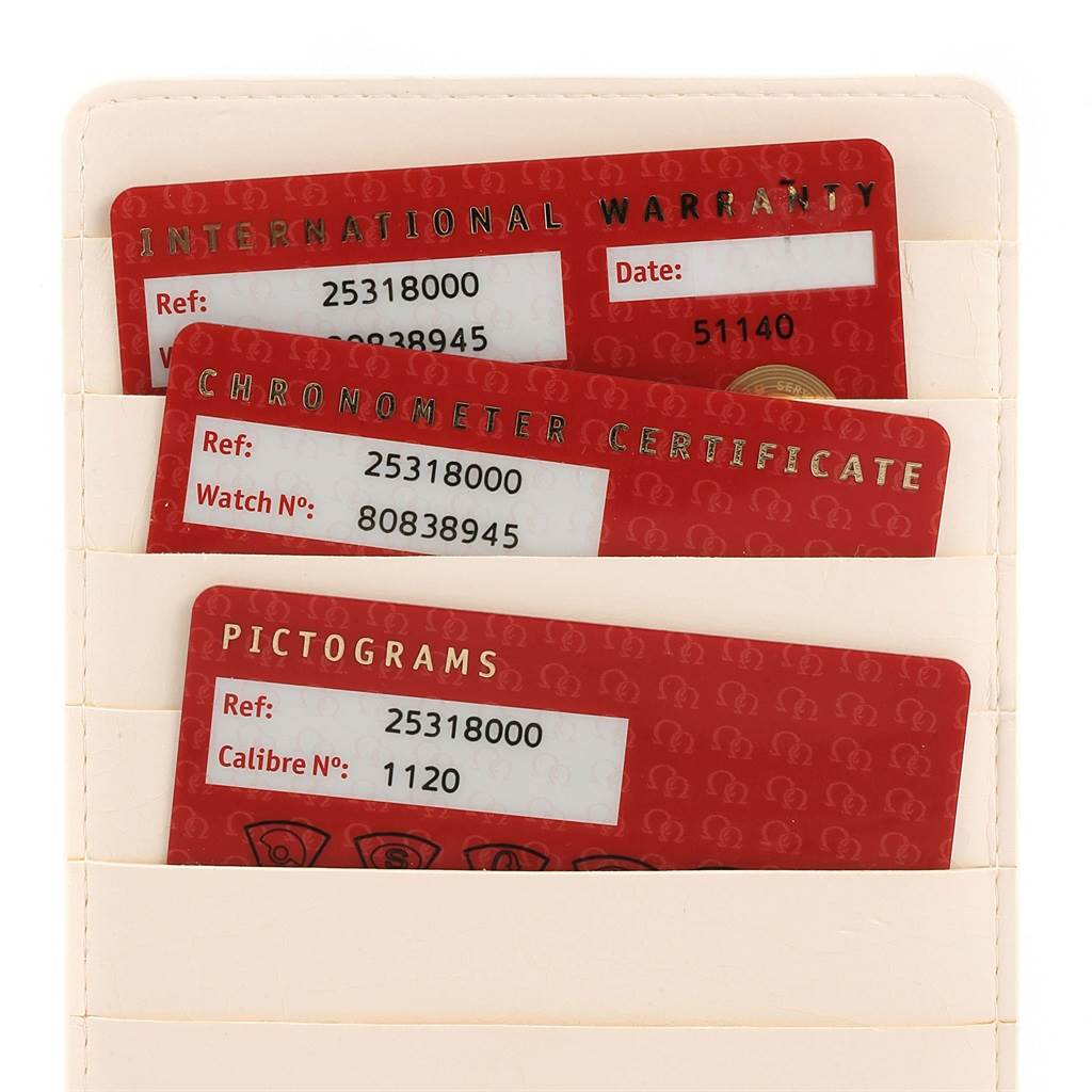 The image shows warranty, chronometer certificate, and pictogram cards for an Omega Seamaster 2531.80.00 Men
s Stainless Steel Blue Dial 2531.80.00 Men
s Stainless Steel Blue Dial watch.