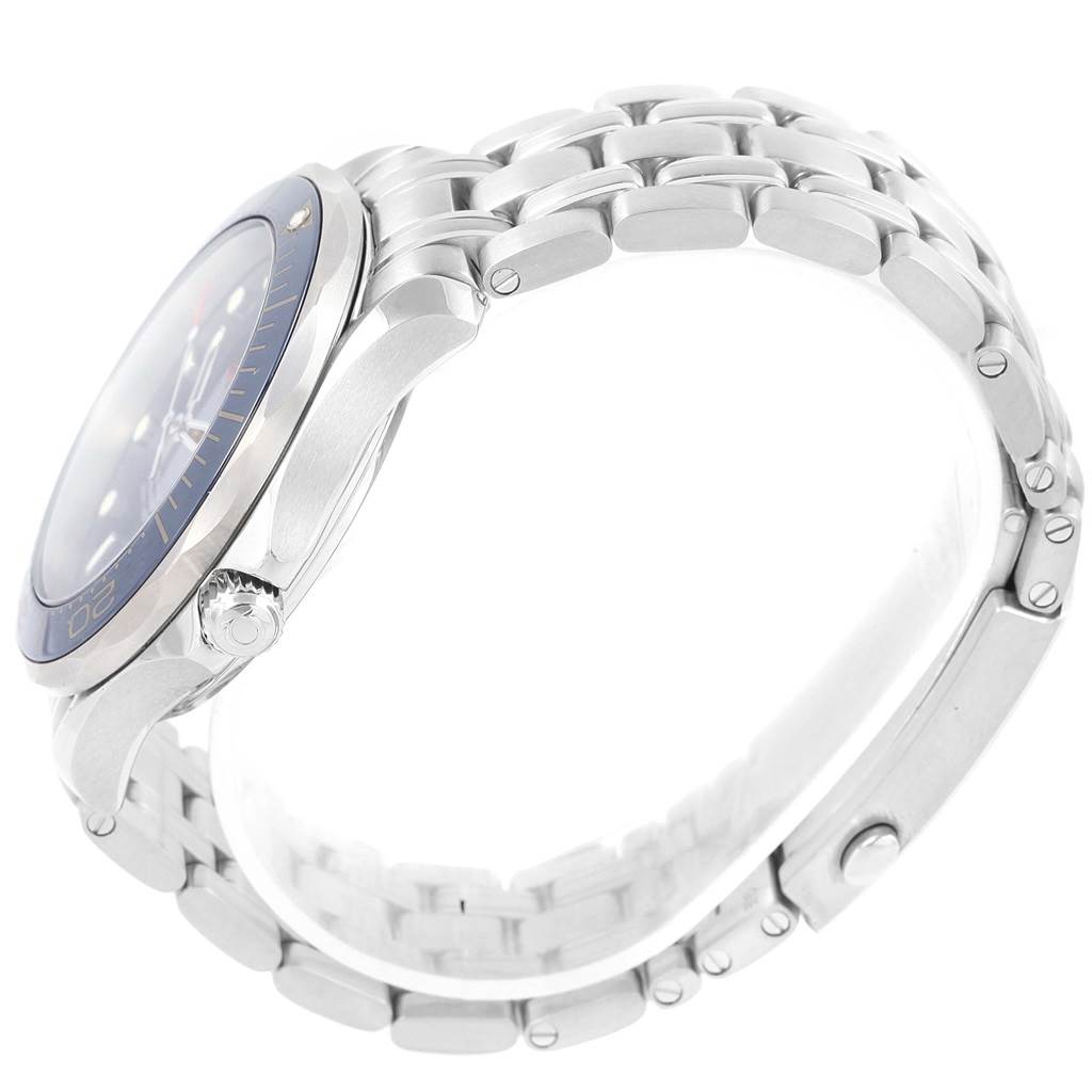 The image shows a side view of the Omega Seamaster 212.30.41.20.03.001 Men
s Stainless Steel Blue Dial 212.30.41.20.03.001 Men
s Stainless Steel Blue Dial watch, highlighting its bezel, crown, and metallic bracelet.