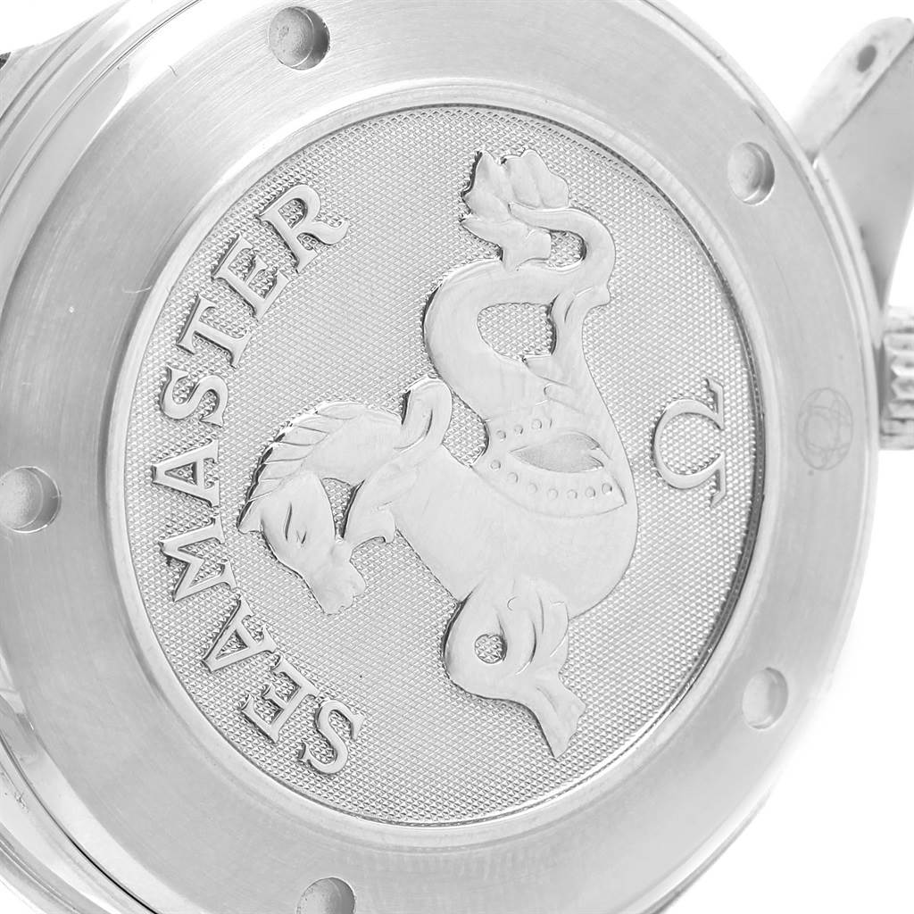 The image shows the engraved case back of an Omega Seamaster 2220.80.00 Men
s Stainless Steel Blue Dial 2220.80.00 Men
s Stainless Steel Blue Dial watch from a close-up angle.