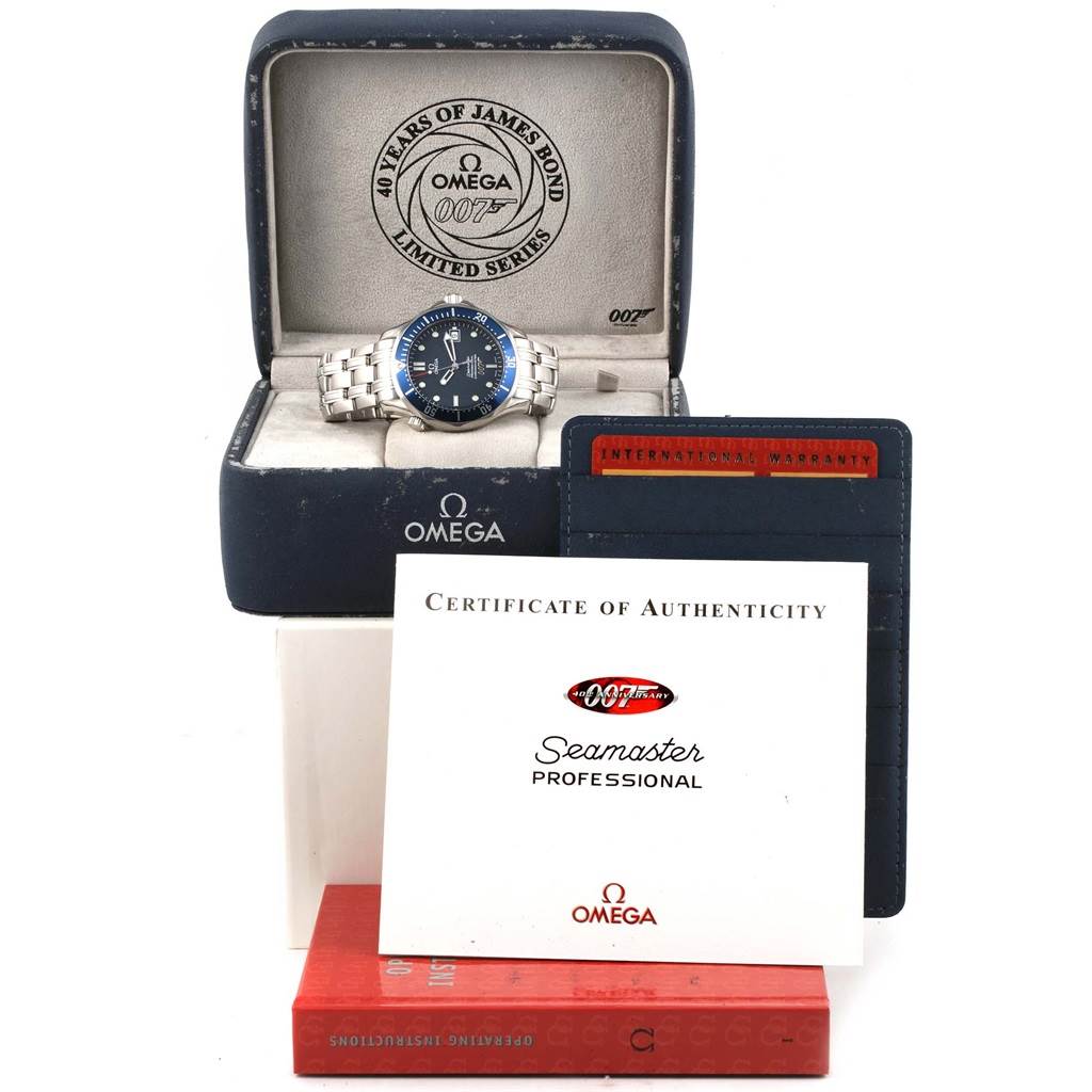 The Omega Seamaster 2537.80.00 Men's Stainless Steel Blue Dial 2537.80.00 Men's Stainless Steel Blue Dial watch is shown in its case with manuals, a certificate of authenticity, and an international warranty card.