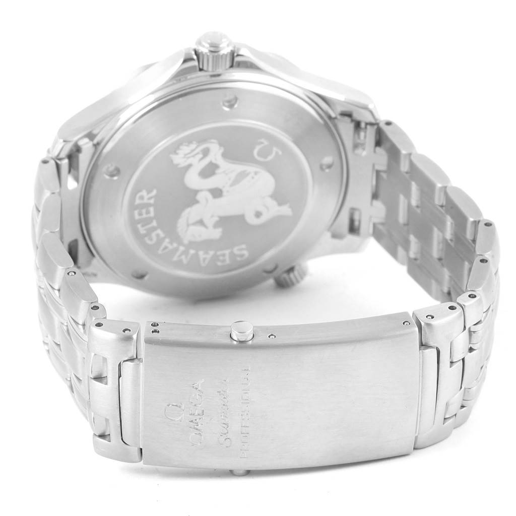 The image shows the back and clasp of a Seamaster model by Omega, highlighting its stainless steel bracelet and engraved case back.