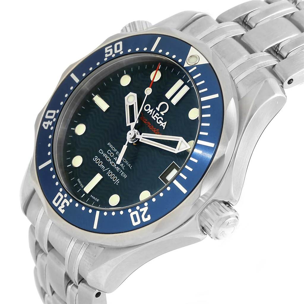 The Omega Seamaster 2222.80.00 Men
s Stainless Steel Blue Dial 2222.80.00 Men
s Stainless Steel Blue Dial watch is shown at an angle highlighting its face, blue bezel, crown, and stainless steel bracelet.