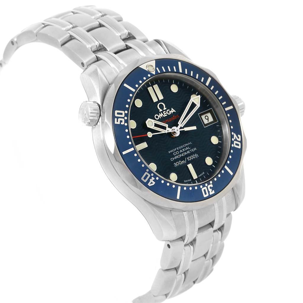 The image shows a tilted angle of an Omega Seamaster 2222.80.00 Men
s Stainless Steel Blue Dial 2222.80.00 Men
s Stainless Steel Blue Dial watch, highlighting the bezel, dial, and stainless steel bracelet.