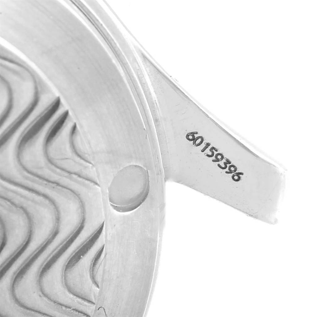 The image shows a close-up of the caseback and lug of an Omega Seamaster 2551.80.00 Men's Stainless Steel Blue Dial 2551.80.00 Men's Stainless Steel Blue Dial watch with the serial number visible.