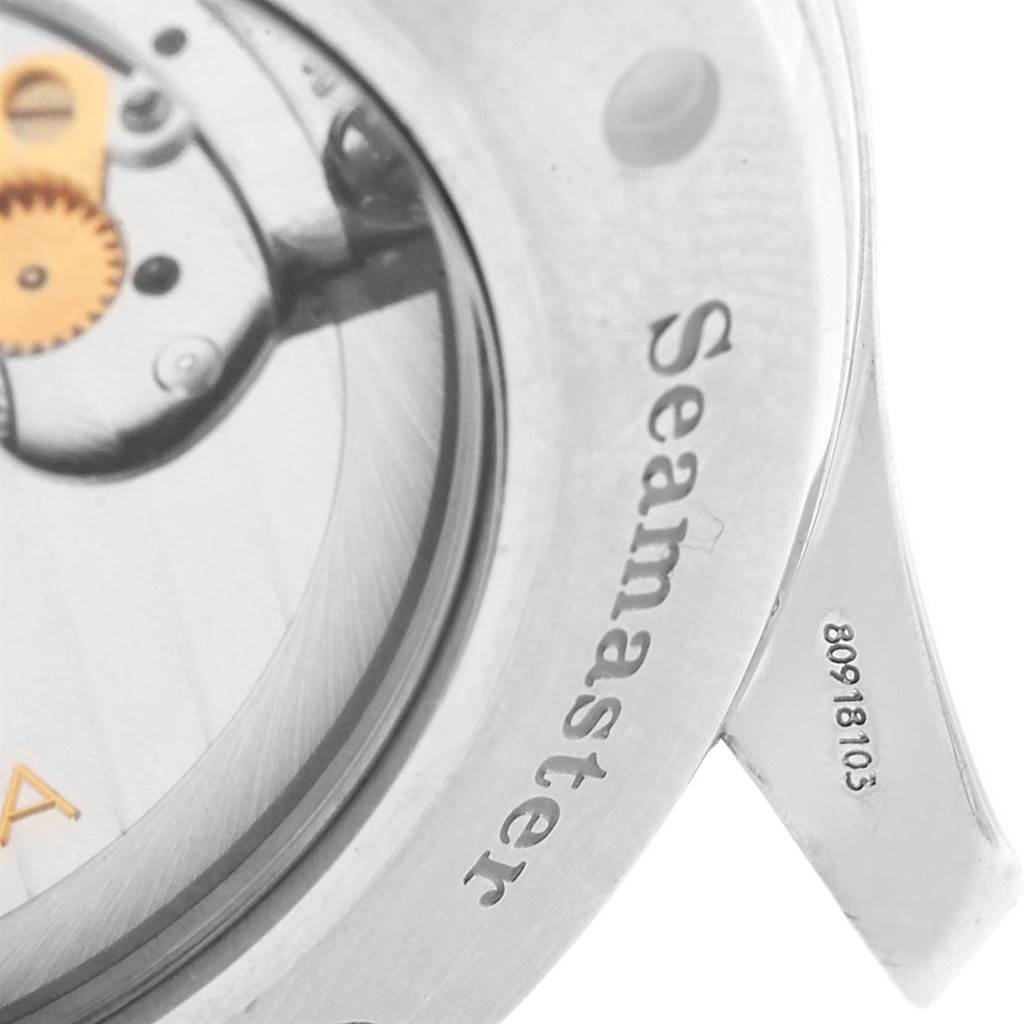 This close-up angle shows the case back of the Omega Seamaster 2535.80.00 Men
s Stainless Steel Blue Dial 2535.80.00 Men
s Stainless Steel Blue Dial watch, revealing part of its internal mechanism and engravings.