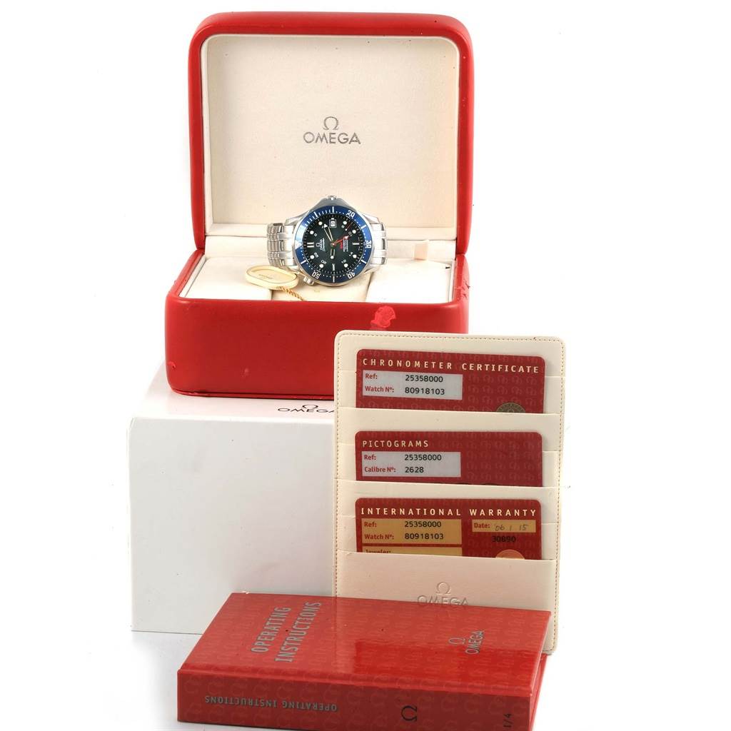 The Omega Seamaster 2535.80.00 Men
s Stainless Steel Blue Dial 2535.80.00 Men
s Stainless Steel Blue Dial watch is shown in its open case with certifications and an operating instructions booklet.