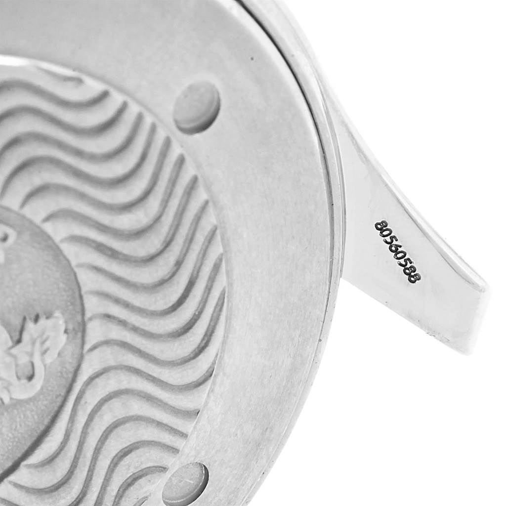 Close-up of the case back and a lug of the Omega Seamaster 2531.80.00 Men's Stainless Steel Blue Dial 2531.80.00 Men's Stainless Steel Blue Dial watch, showcasing the wave pattern and engraved numbers.