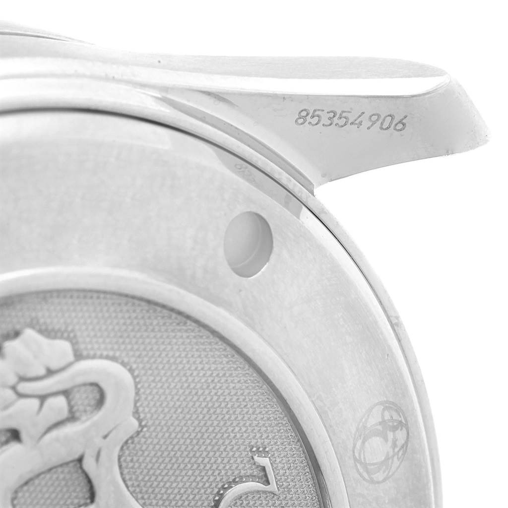 This close-up image shows the serial number and case back detailing of the Omega Seamaster 212.30.41.20.01.002 Men
s Stainless Steel Black Dial 212.30.41.20.01.002 Men
s Stainless Steel Black Dial watch.