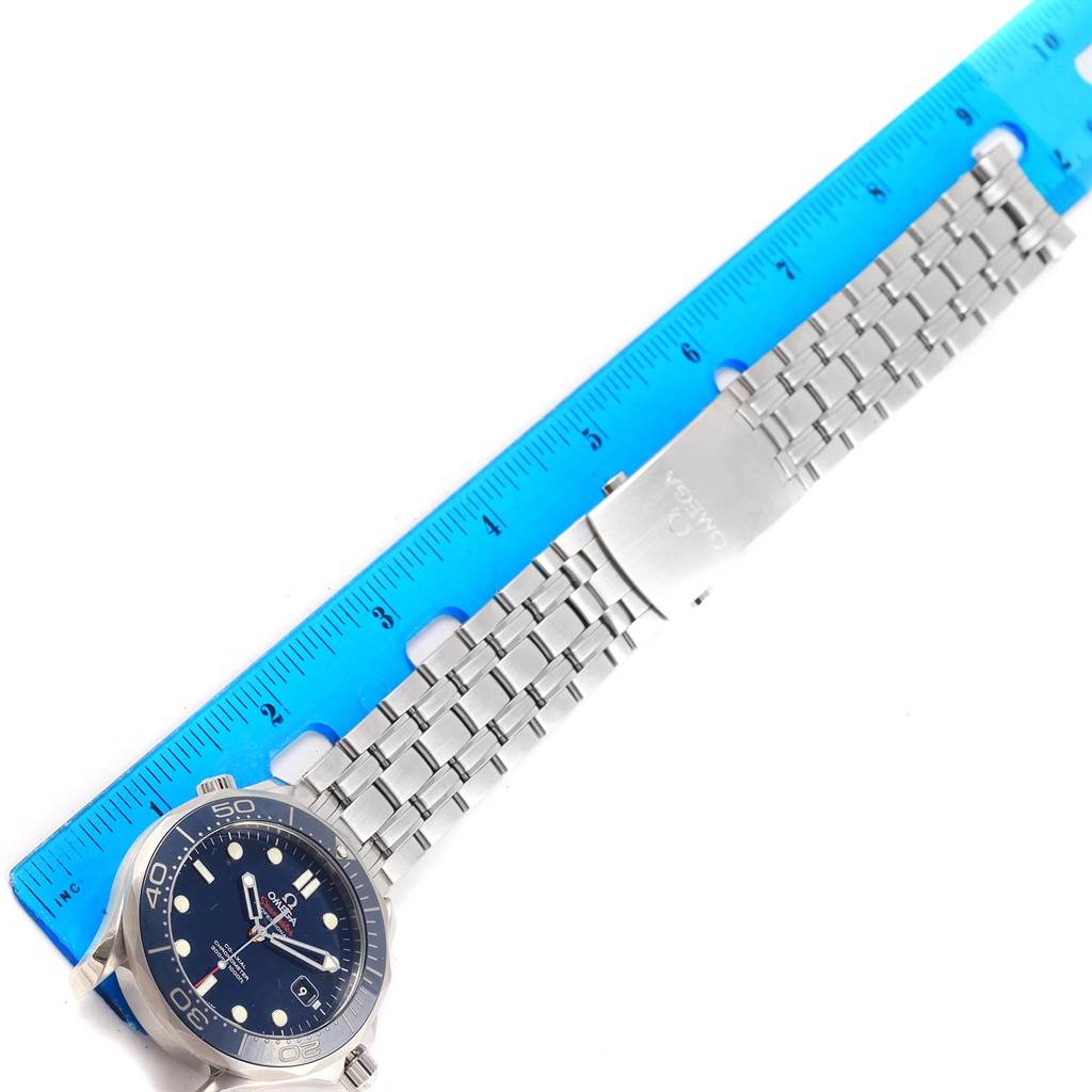 The Omega Seamaster 212.30.41.20.03.001 Men
s Stainless Steel Blue Dial 212.30.41.20.03.001 Men
s Stainless Steel Blue Dial watch is shown face-up, with a ruler measuring its stainless steel bracelet and clasp.