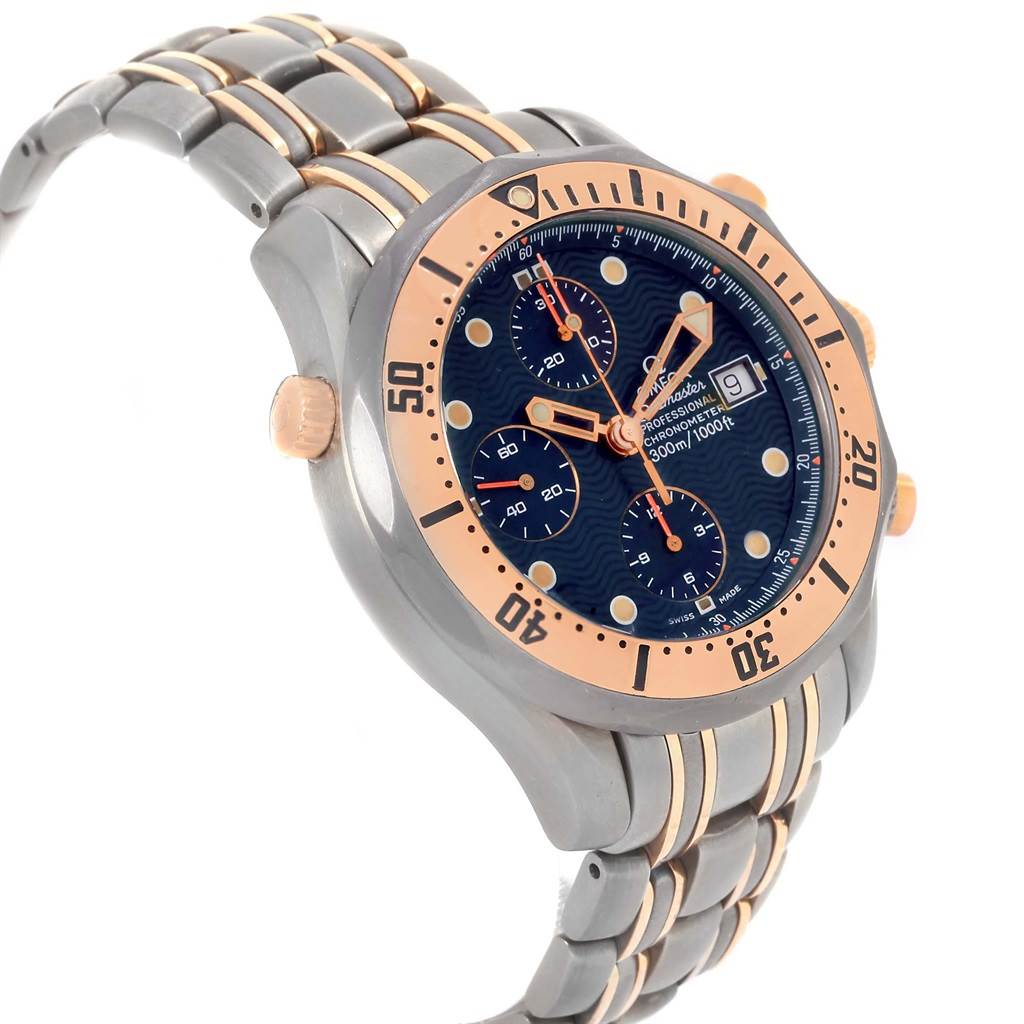 The image shows a side angle of the Omega Seamaster 2296.80.00 Men
s Titanium Blue Dial 2296.80.00 Men
s Titanium Blue Dial watch, highlighting its bezel, dial, crown, and bracelet.