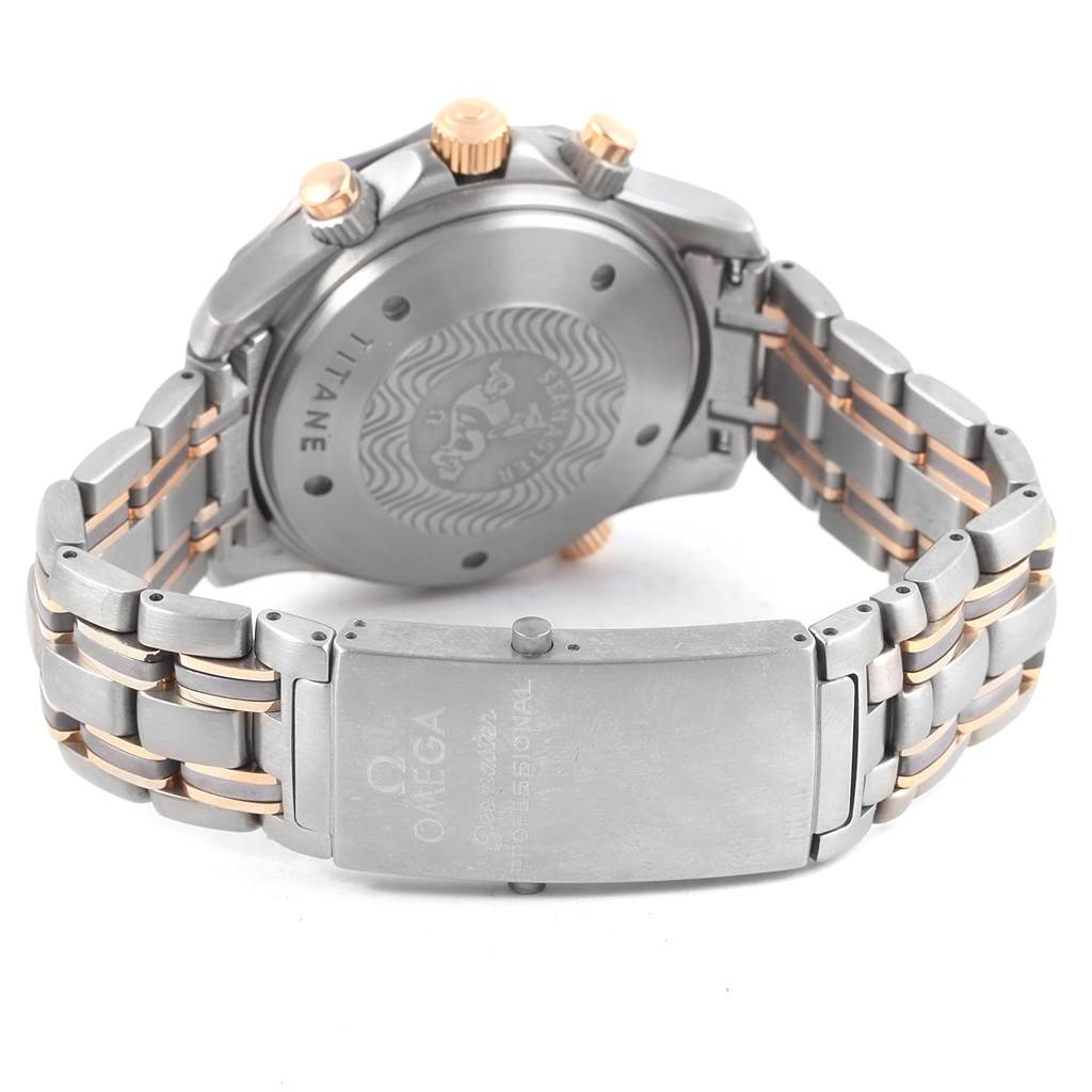 The image shows the back case, crown, and bracelet clasp of an Omega Seamaster 2296.80.00 Men
s Titanium Blue Dial 2296.80.00 Men
s Titanium Blue Dial watch from a rear angle.