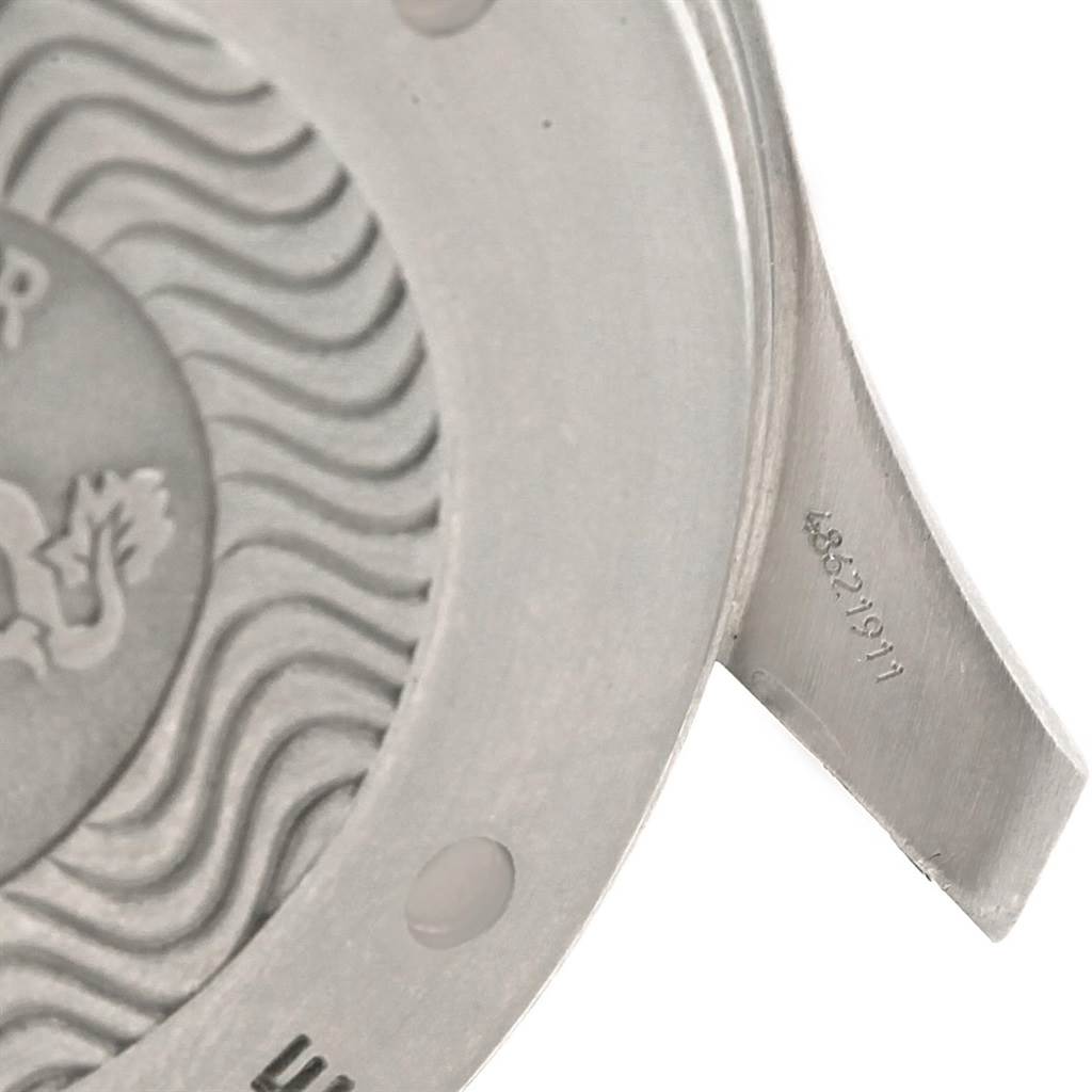 The image shows the back case and part of the strap attachment of an Omega Seamaster 2296.80.00 Men
s Titanium Blue Dial 2296.80.00 Men
s Titanium Blue Dial.