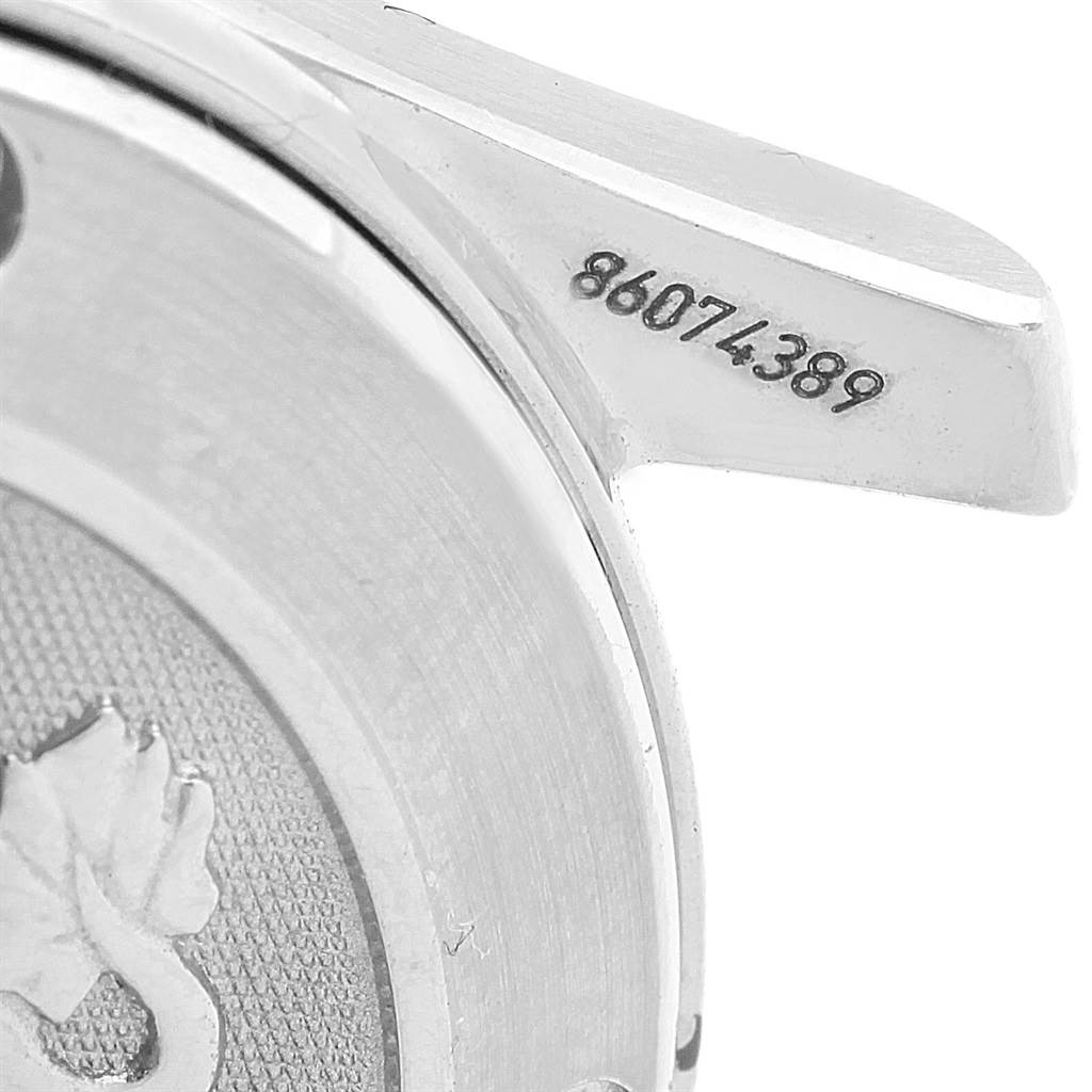 This image shows the back and lug of an Omega Seamaster 212.30.36.20.01.001 Men
s Stainless Steel Black Dial 212.30.36.20.01.001 Men
s Stainless Steel Black Dial watch with part of its serial number visible.