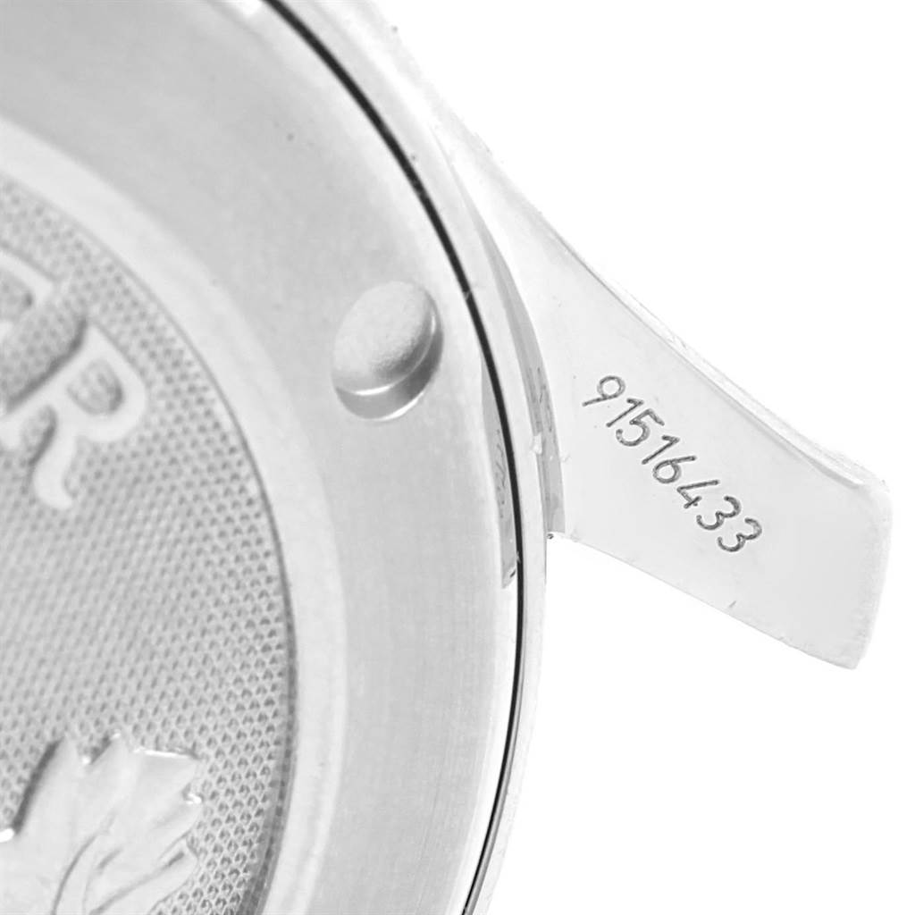 This image shows a close-up of the case back and the lug with a serial number engraved on an Omega Seamaster 212.30.36.61.01.001 Men
s Stainless Steel Black Dial 212.30.36.61.01.001 Men
s Stainless Steel Black Dial watch.