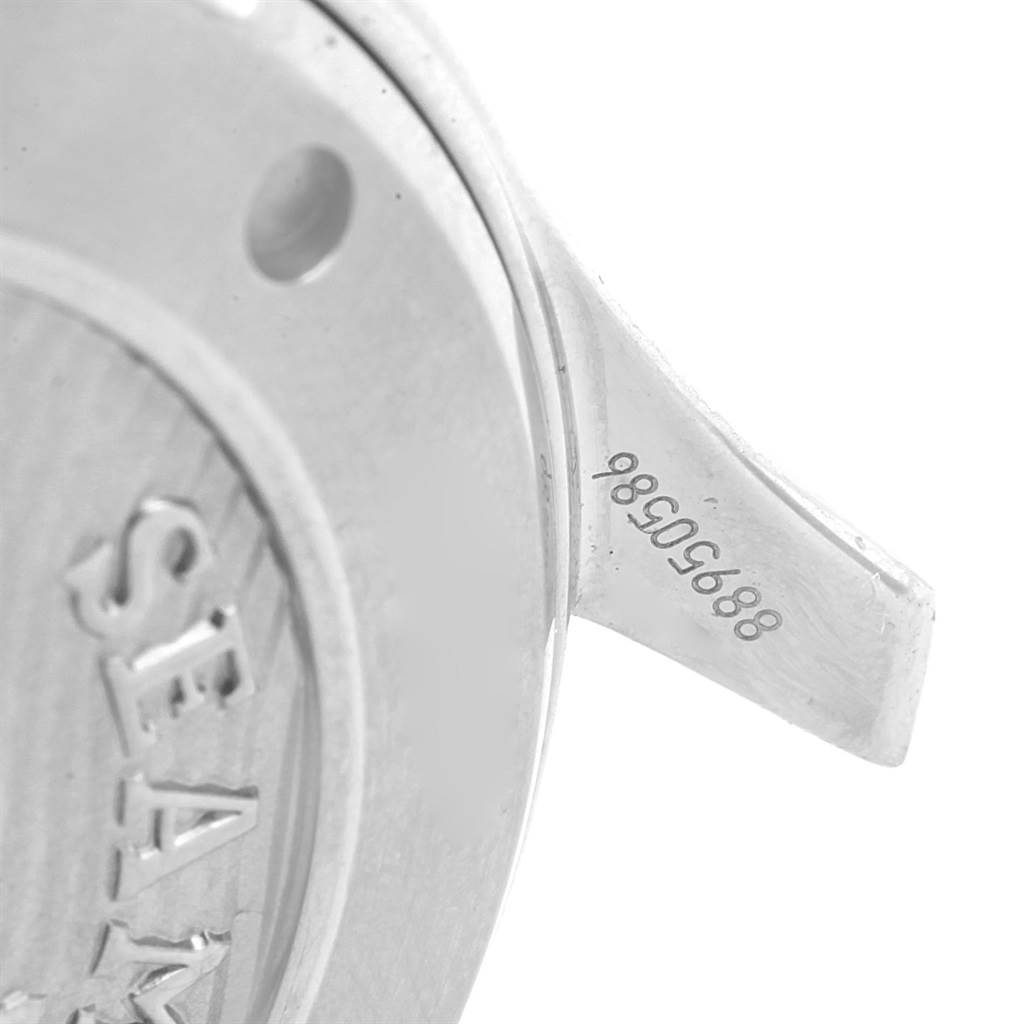 This image shows a close-up of the rear case and lug area of an Omega Seamaster 212.30.41.20.01.003 Men
s Stainless Steel Black Dial 212.30.41.20.01.003 Men
s Stainless Steel Black Dial watch, with part of the serial number visible.