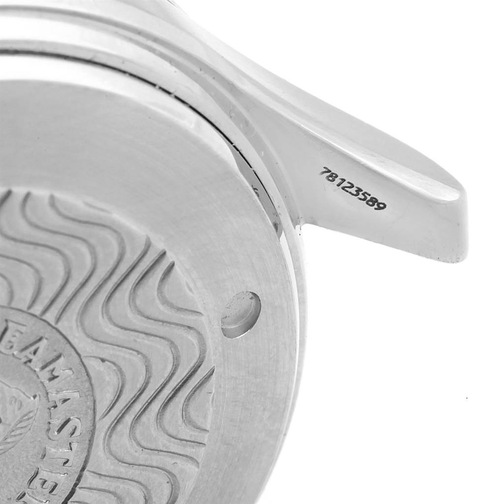 This image shows the case back and lug of an Omega Seamaster 2594.52.00 Men
s Stainless Steel Black Dial 2594.52.00 Men
s Stainless Steel Black Dial watch, displaying its engraved design and serial number.