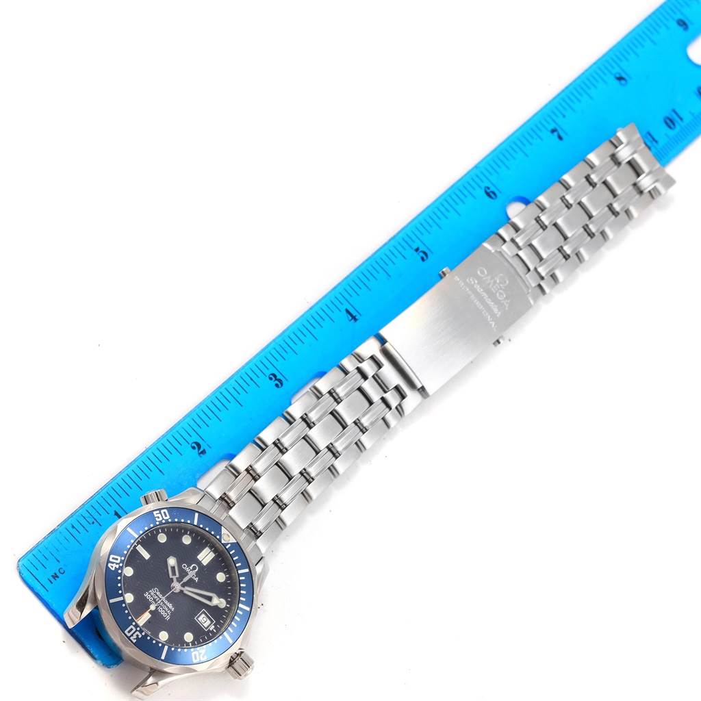 The Omega Seamaster 2561.80.00 Men's Stainless Steel Blue Dial 2561.80.00 Men's Stainless Steel Blue Dial watch is shown from a top view, displaying the full face and bracelet with a metal clasp.