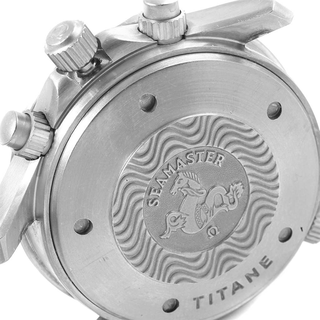 The image shows the back case and crown side of the Omega Seamaster 2298.80.00 Men
s Titanium Blue Dial 2298.80.00 Men
s Titanium Blue Dial watch, displaying the engraved logo and "TITANE" text.