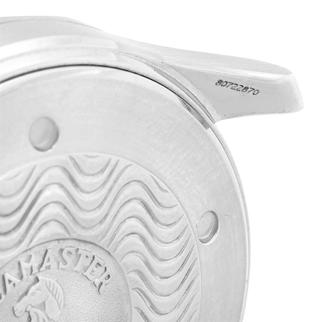 This image shows a close-up of the case back and part of the lug of an Omega Seamaster 2531.80.00 Men
s Stainless Steel Blue Dial 2531.80.00 Men
s Stainless Steel Blue Dial watch.