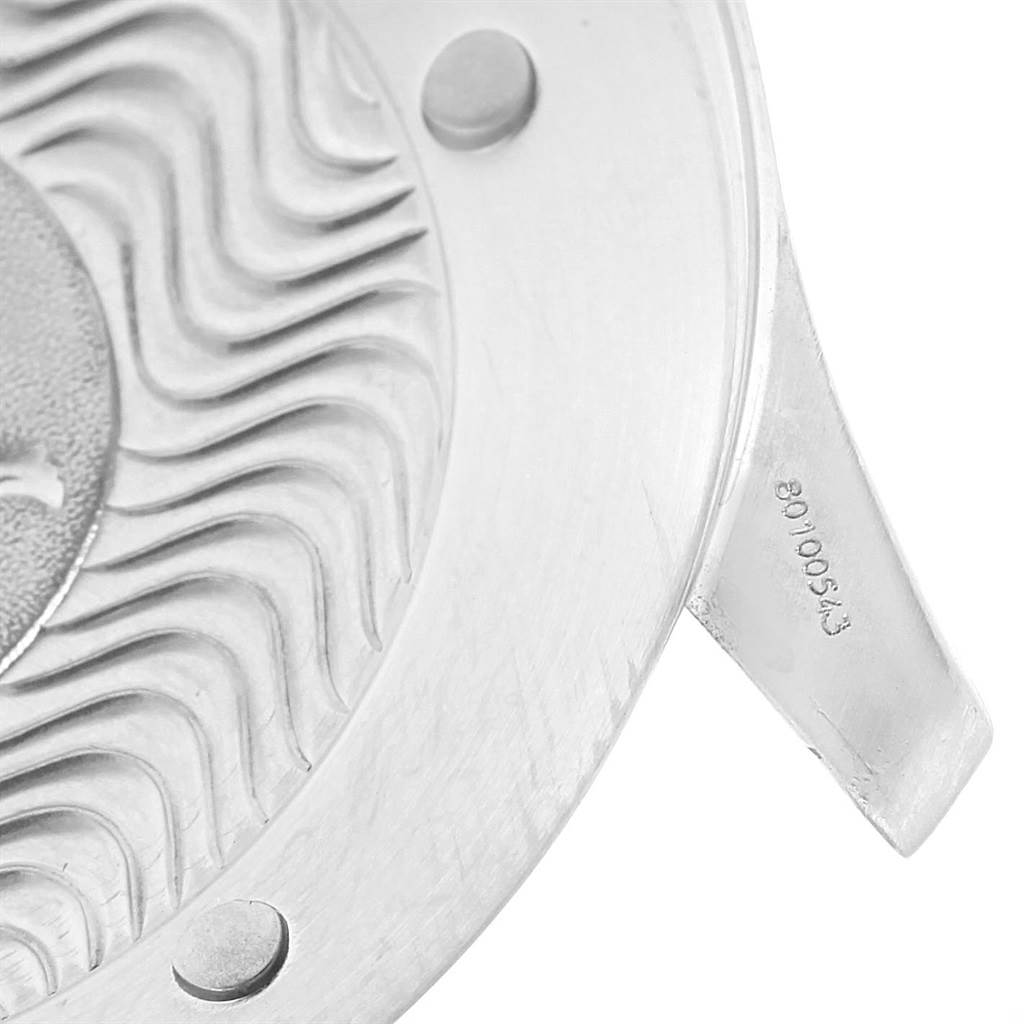 Close-up of the Omega Seamaster 2538.20.00 Men
s Stainless Steel White Dial 2538.20.00 Men
s Stainless Steel White Dial watch
s case back, showcasing its wave pattern and part of the serial number.