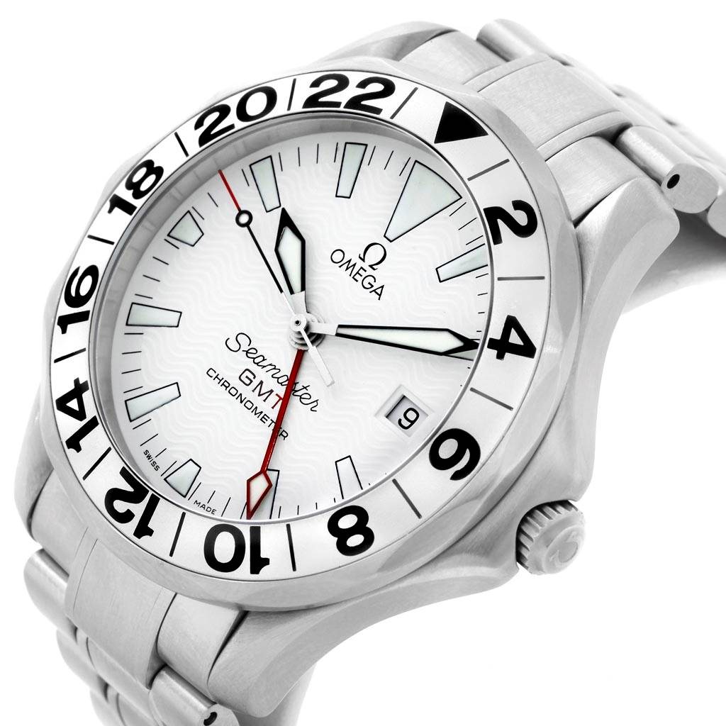 The image shows an Omega Seamaster 2538.20.00 Men
s Stainless Steel White Dial 2538.20.00 Men
s Stainless Steel White Dial GMT wristwatch at a slight side angle, highlighting the white dial, 24-hour bezel, and part of the metal bracelet.