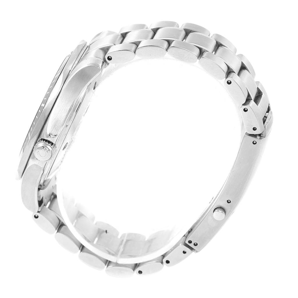 The image shows the side view of an Omega Seamaster 2264.50.00 Men
s Stainless Steel Black Dial 2264.50.00 Men
s Stainless Steel Black Dial watch, highlighting its metal bracelet, case, and crown.