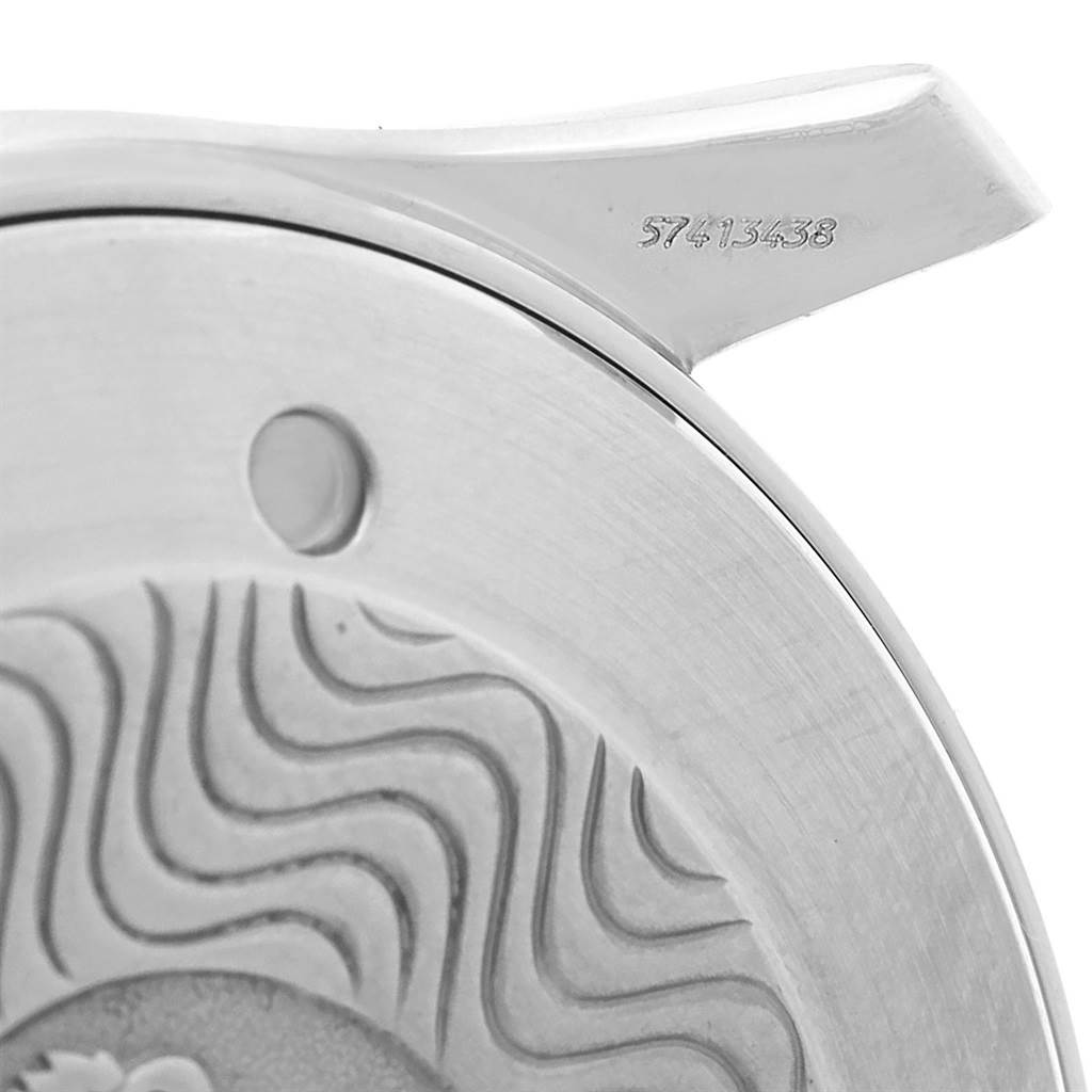 This image shows a close-up of the back case and lug of an Omega Seamaster 2264.50.00 Men
s Stainless Steel Black Dial 2264.50.00 Men
s Stainless Steel Black Dial watch, featuring wavy patterns and a serial number.