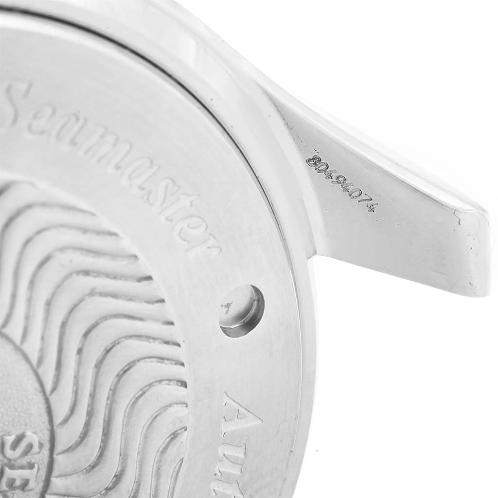 The image shows a close-up of the case back and part of the lug of an Omega Seamaster 2569.50.00 Men
s Stainless Steel Black Dial 2569.50.00 Men
s Stainless Steel Black Dial watch.