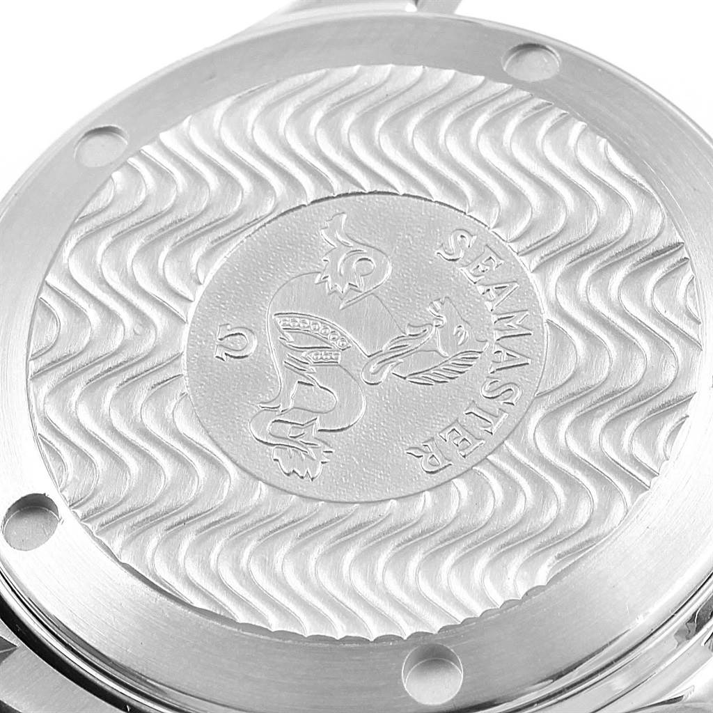 The image shows the case back of the Omega Seamaster 2561.80.00 Men's Stainless Steel Blue Dial 2561.80.00 Men's Stainless Steel Blue Dial watch, highlighting its intricate wave pattern and emblem.